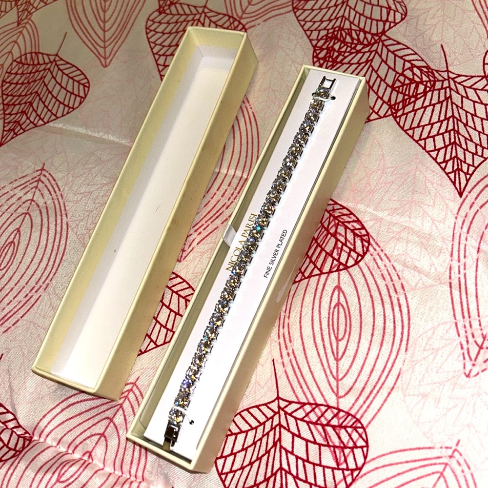Brand new Nicola Parisi bracelet with fine silver plated, real silver .